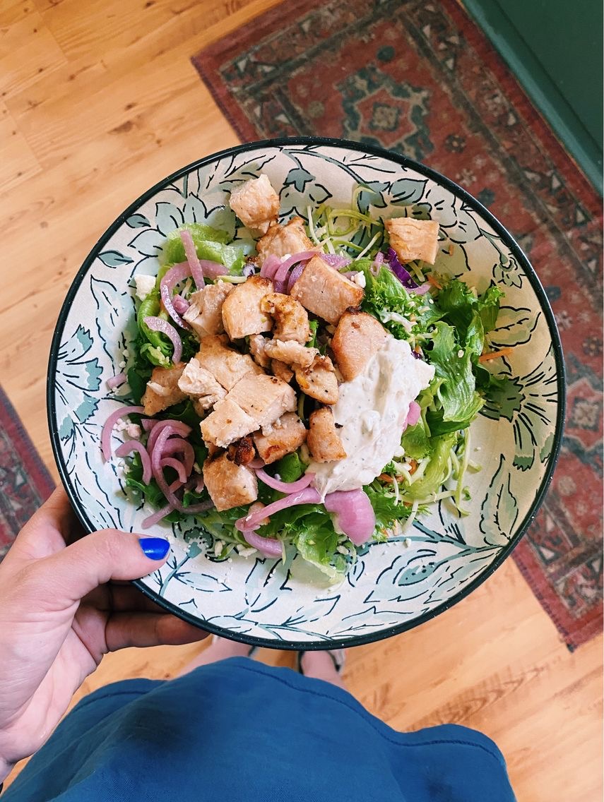 salad with lettuce, chicken and hummus